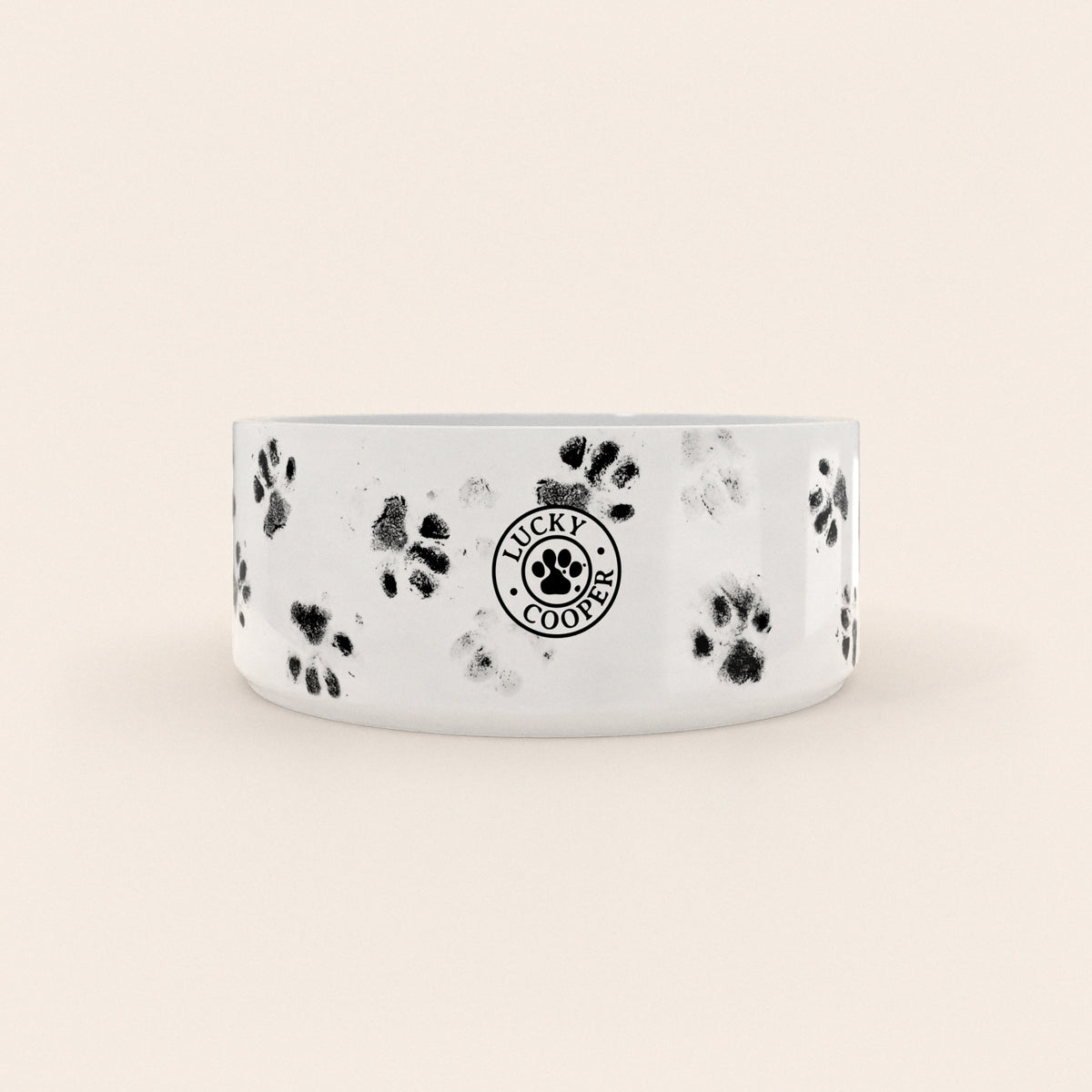 Dos d'une gamelle pour chien au motif Pattes Noires avec le logo Lucky Cooper