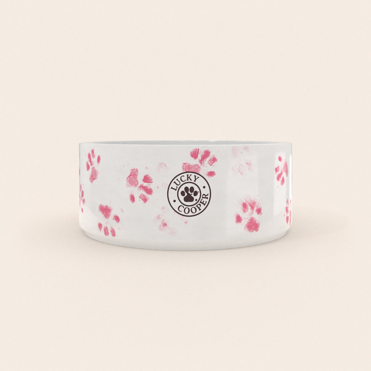 Dos d'une gamelle pour chien au motif Pattes Roses avec le logo Lucky Cooper