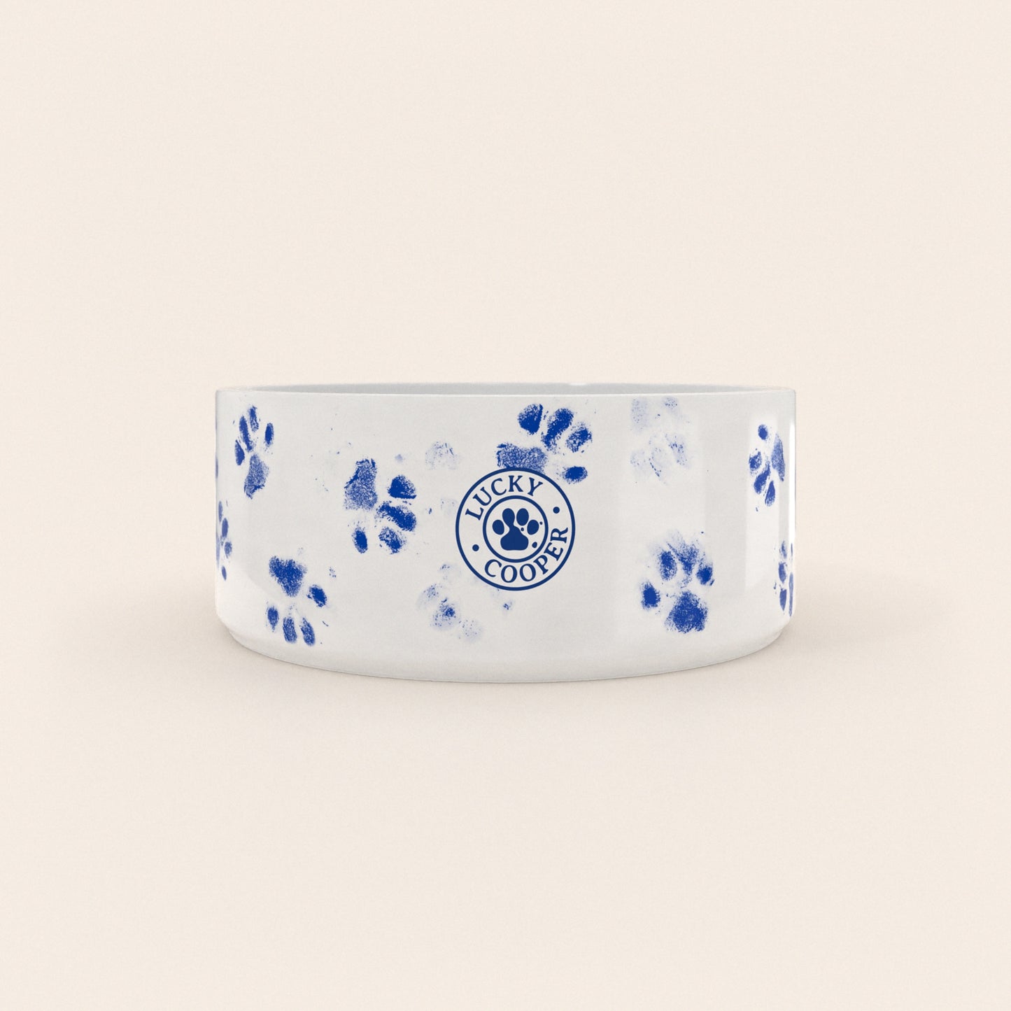 Dos d'une gamelle pour chien au motif Pattes Bleues avec le logo Lucky Cooper